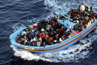 Un barcone di migranti (Marco Di Lauro/Getty Images)