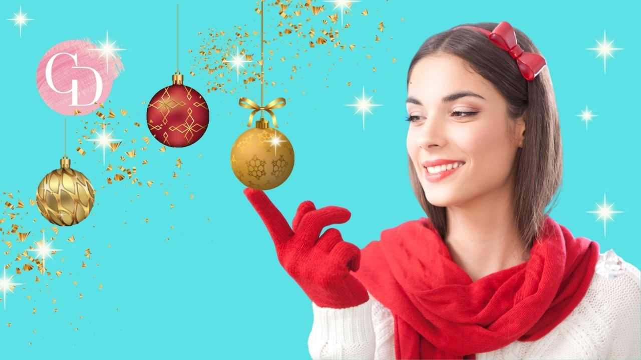 acconciature con il cerchietto ragazza con cerchietto rosso e sfere natalizie 