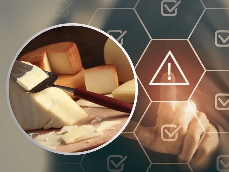 formaggio e simbolo attenzione 