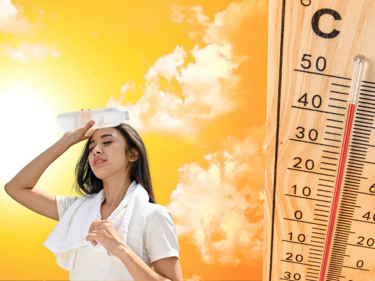 donna sente caldo e termometro