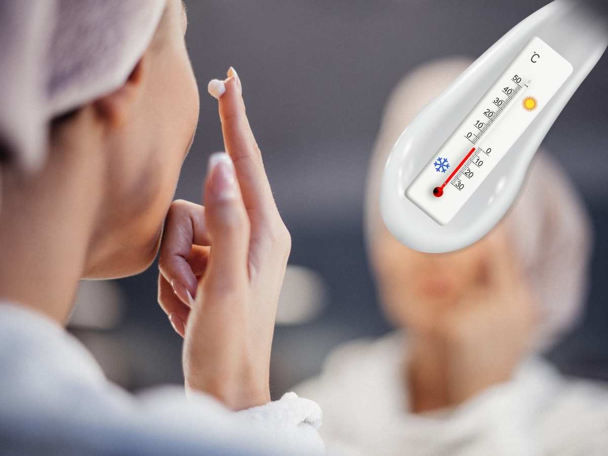 donna che applica crema sul viso, termometro che indica temperature basse