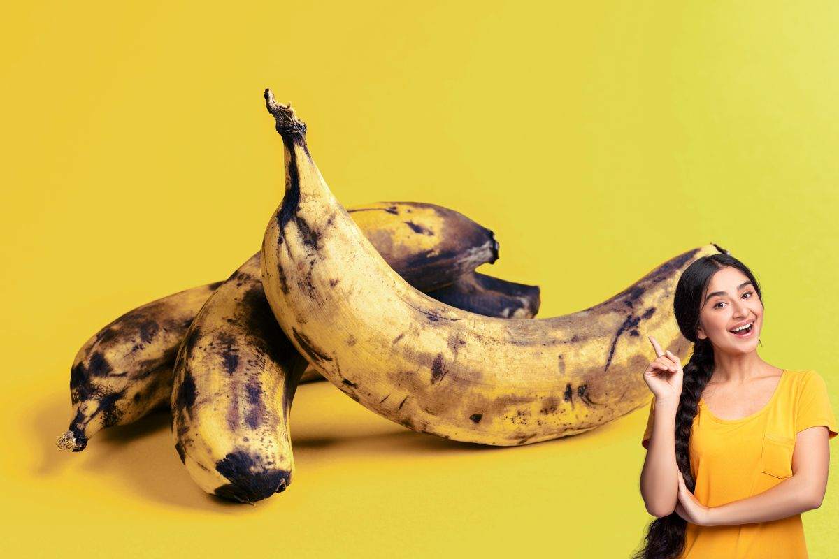 banane mature su sfondo giallo e donna sorpresa